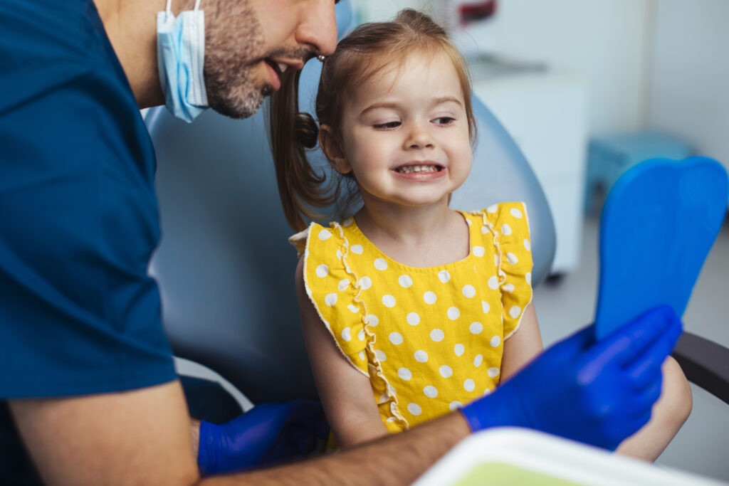 Pediatric Dentist In Glen Mills, Pa 12 A Happy Child With Her Pediatric Dentist After Safe Pediatric Dentistry Under General Anesthesia At Cobblestone Kids In Glen Mills, Pa