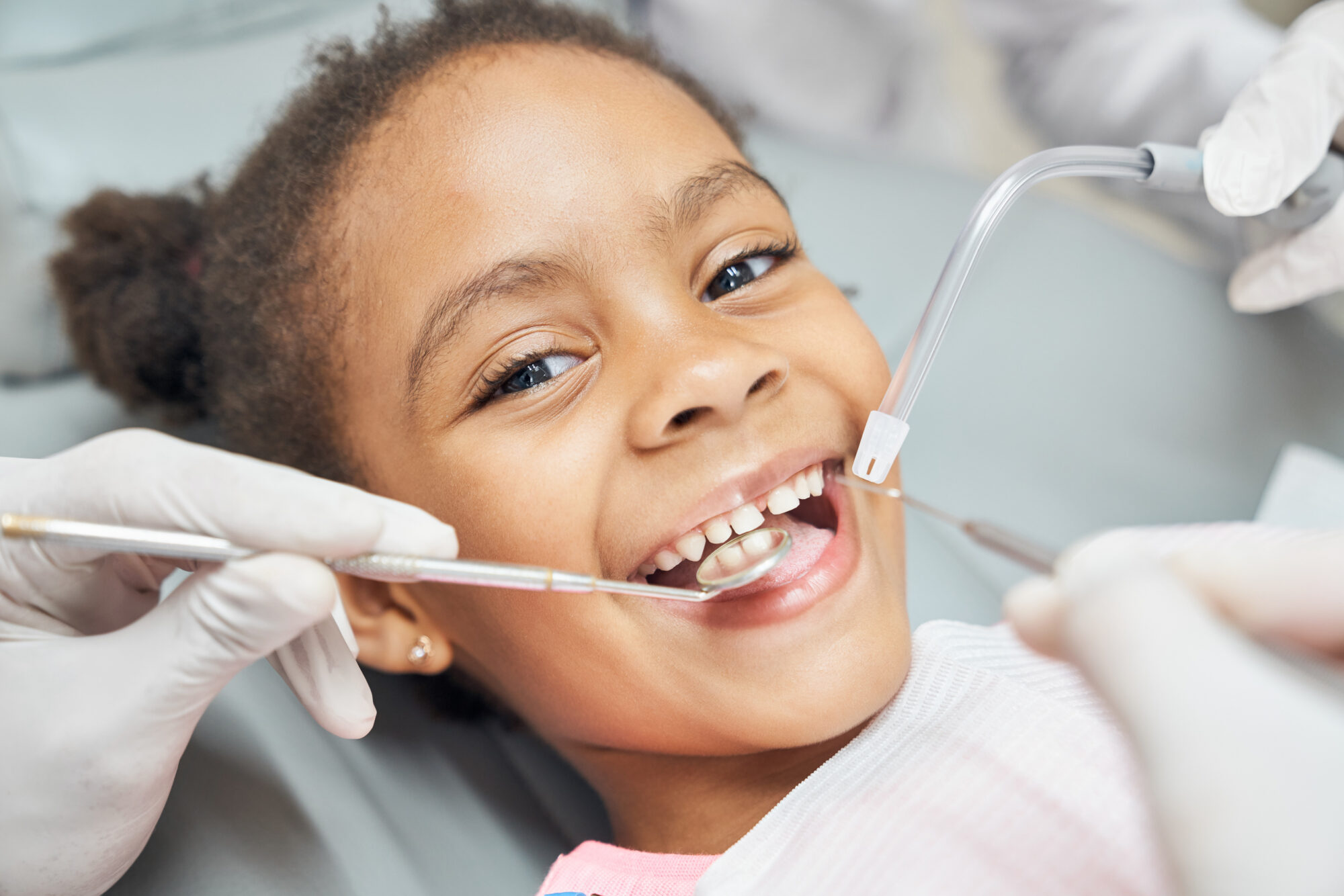 A Board-Certified Specialist Administering Safe Pediatric Dental Sedation Using Gentle Laughing Gas For A Relaxed Child At Cobblestone Kids