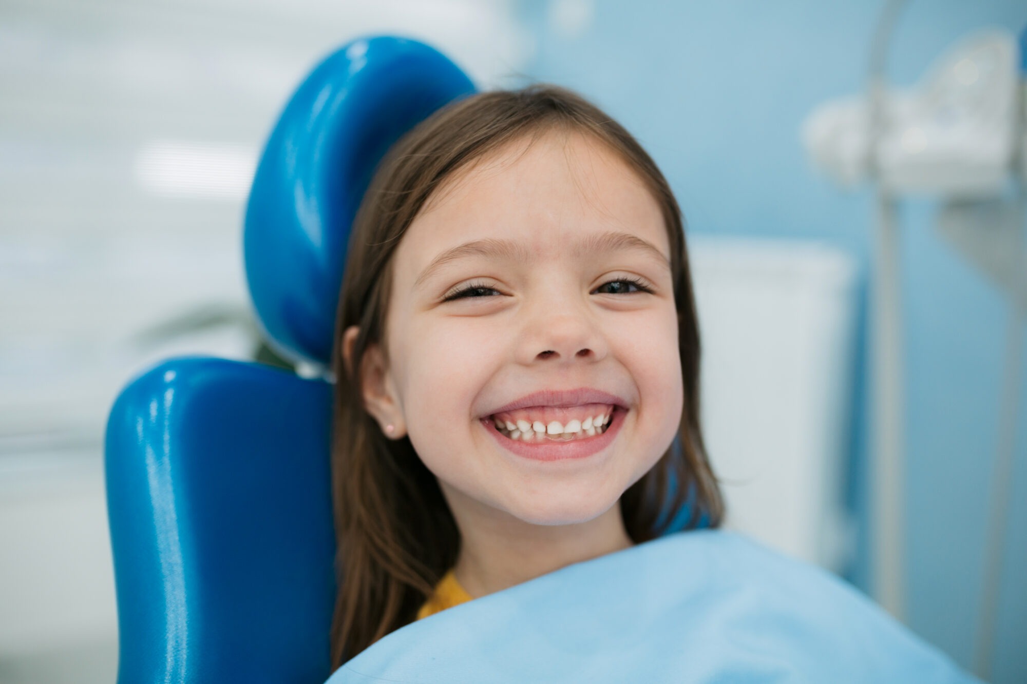 A Board-Certified Specialist Providing Gentle Restorative Pediatric Dentistry And Tooth-Colored Fillings For A Relaxed Child At Cobblestone Kids